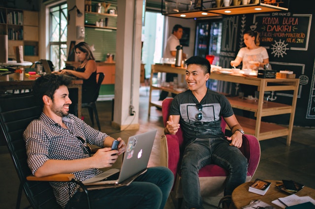 men-having-conversation-seating